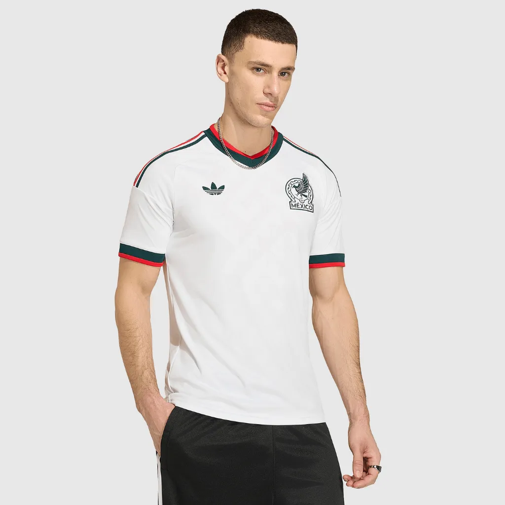 Camisa Mexico 2026 reserva Adidas branca com detalhes em verde e vermelho logo Trefoil
